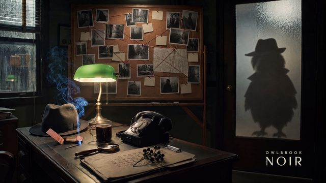 A detective's desk with a green lamp, and the shadow of an owl in a fedora on the office door